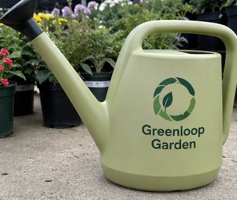 Recycled plastic watering can with a full-color generic eco-brand label