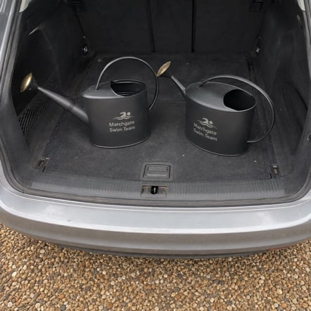 Custom Watering Cans in use