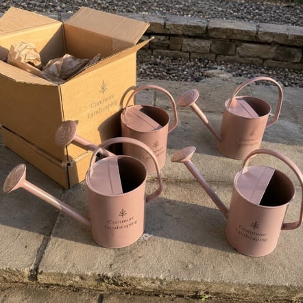 Custom Watering Cans in use