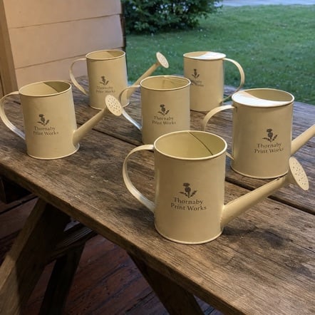 Custom Watering Cans in use